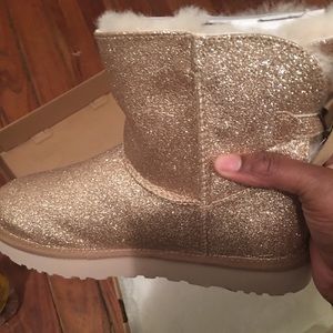 Beautiful ugg boots with bows!! Brand new.